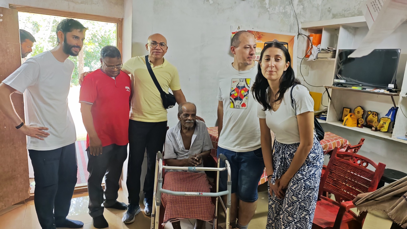 Friends from afar stand with our brothers and a homebound elder.