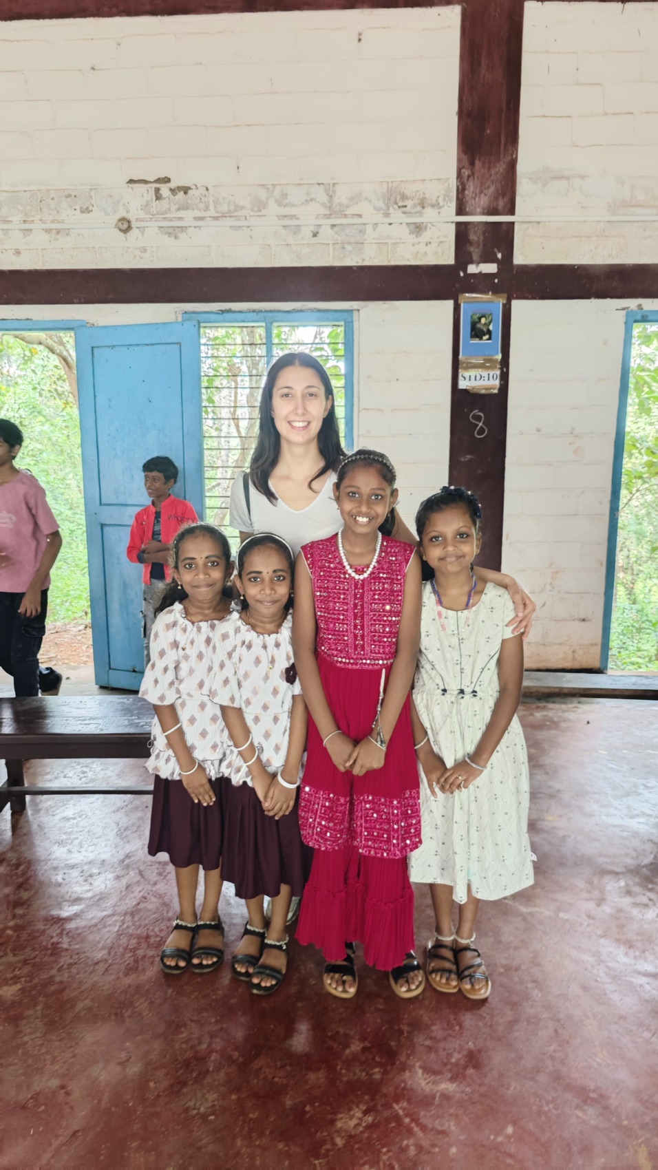 New friendships across borders — a visitor with the children we accompany.
